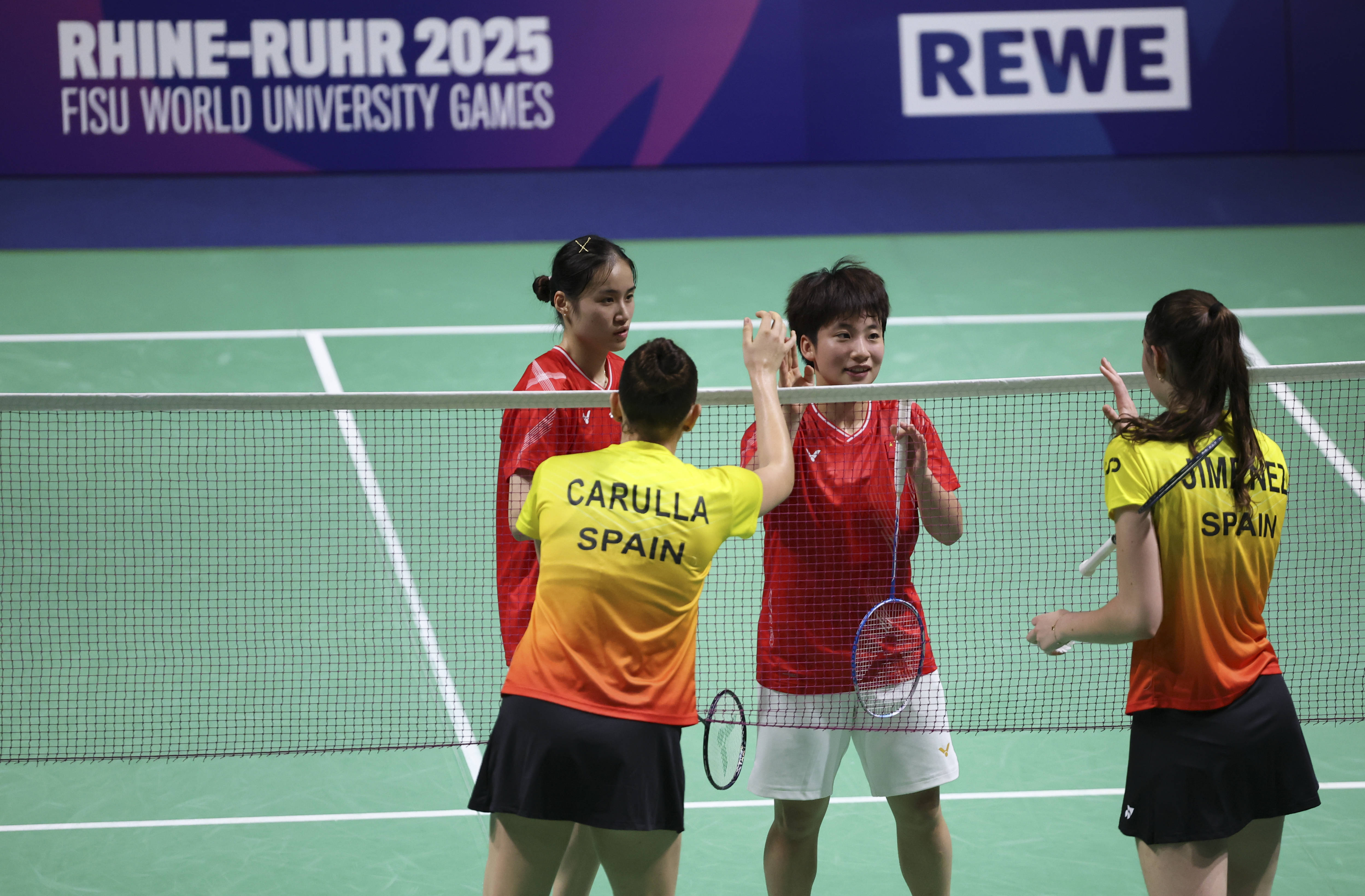 (体育)大运会——羽毛球混合团体小组赛:中国队胜西班牙队